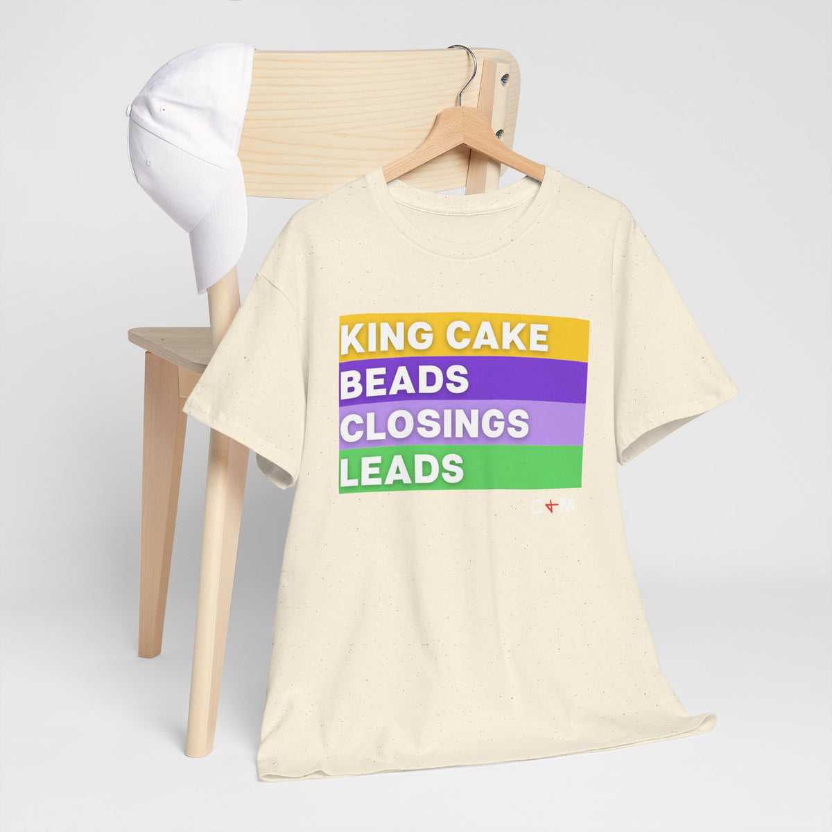 Mardi Gras Vibes Tee — “King Cake, Beads, Closings, Leads” Graphic Shirt